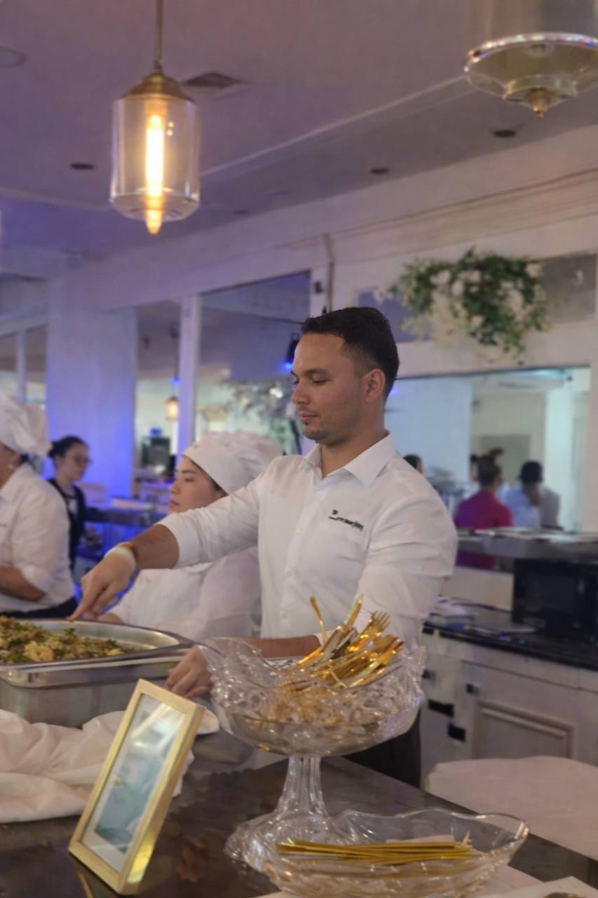 Catering staff serving guests at an elegant event at Carissa Venue